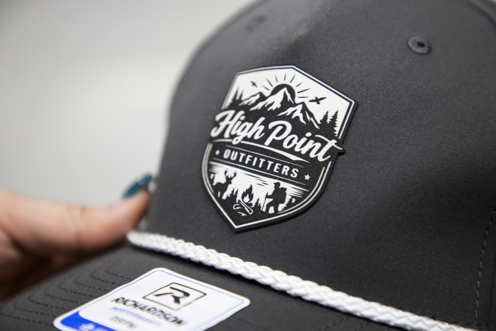 Custom leather patch hat with High Point Outfitters logo on Richardson cap